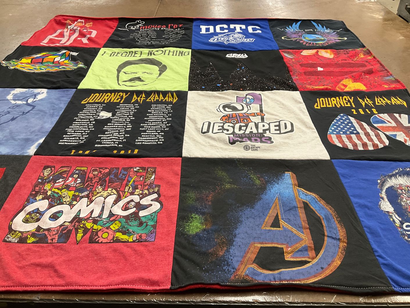 T-shirt quilt with music, comics themes by Rene' from MN