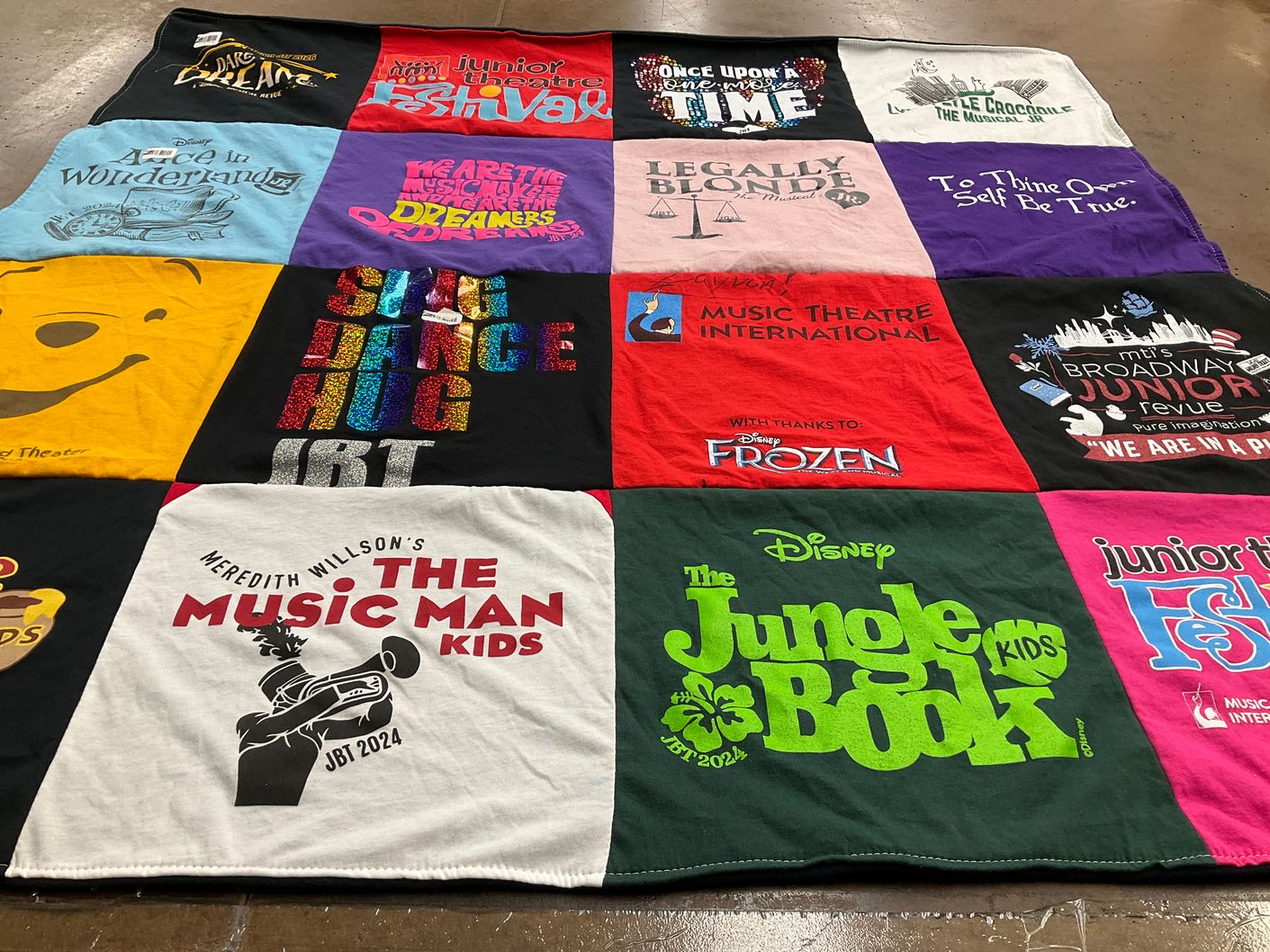 T-shirt quilt with theater, music themes by Danika from PA