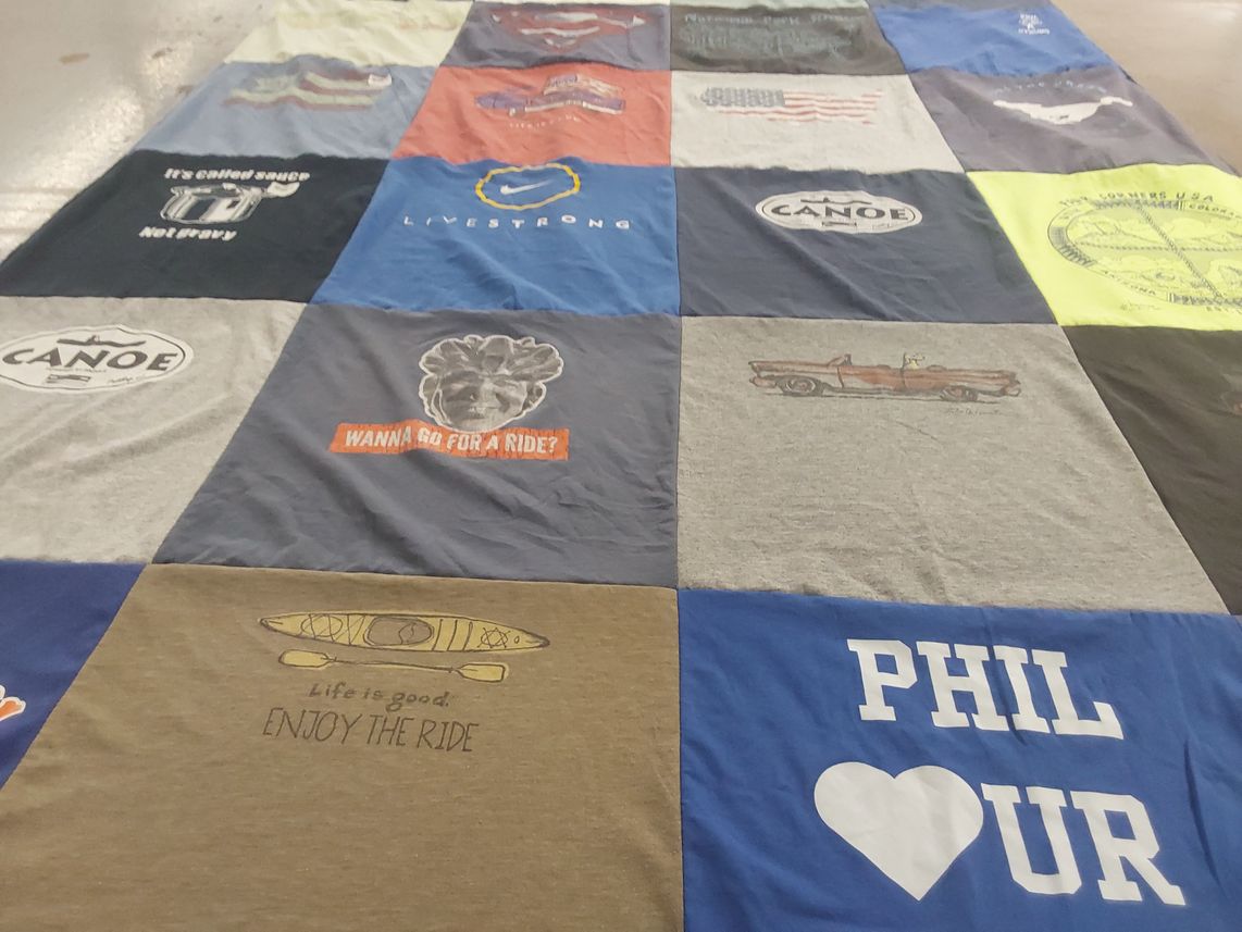 T-shirt quilt with outdoors, canoeing themes by Angela from NY