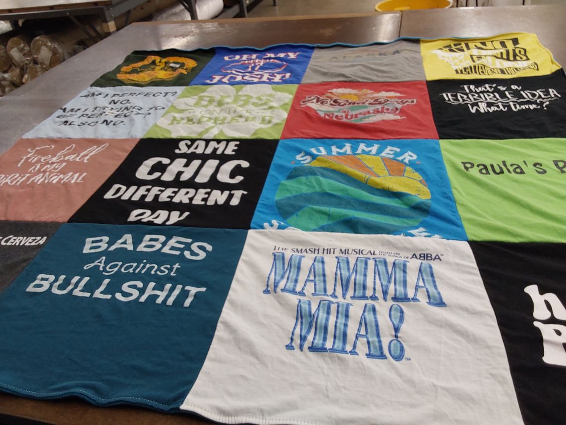 T-shirt quilt with musicals, humor themes by Christine from FL