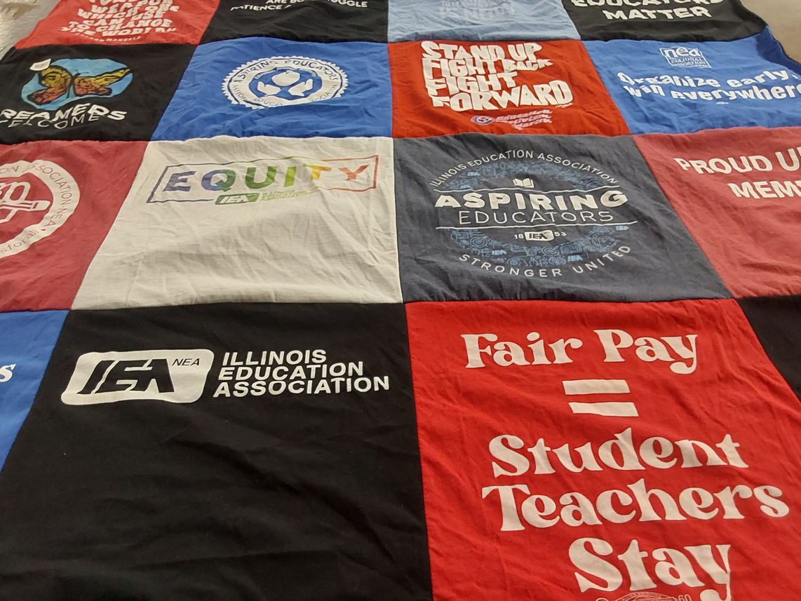 T-shirt quilt with education, equity themes by Emma from IL