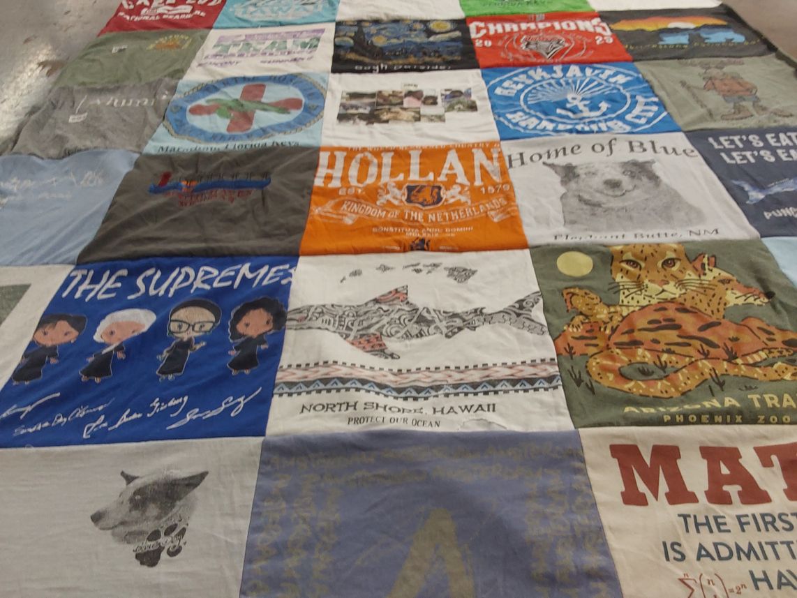 T-shirt quilt with law, animals themes by Hilary from NM