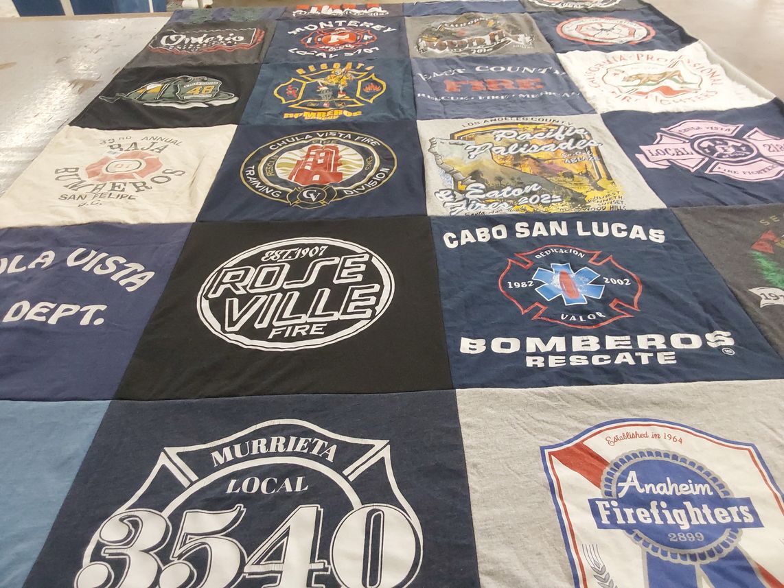 T-shirt quilt with firefighting, emergency services themes by Darrell from CA