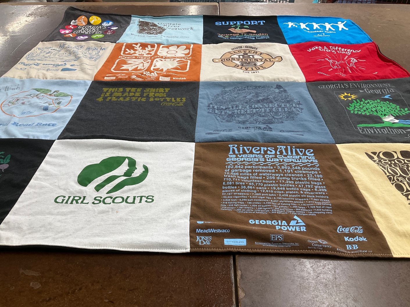T-shirt quilt with environmental conservation, community service themes by Connie from GA
