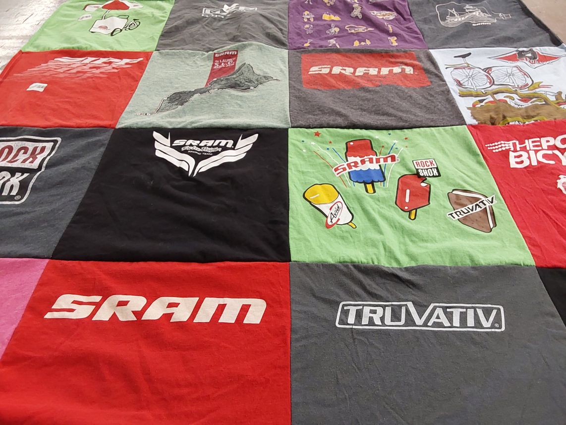 T-shirt quilt with cycling, biking themes by Karen from CA