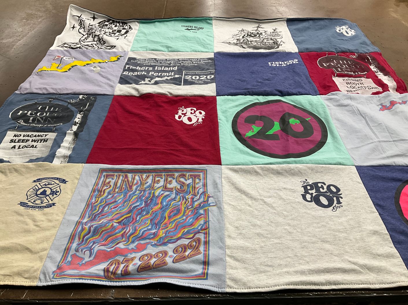 T-shirt quilt with events, community themes by Sydney from CT