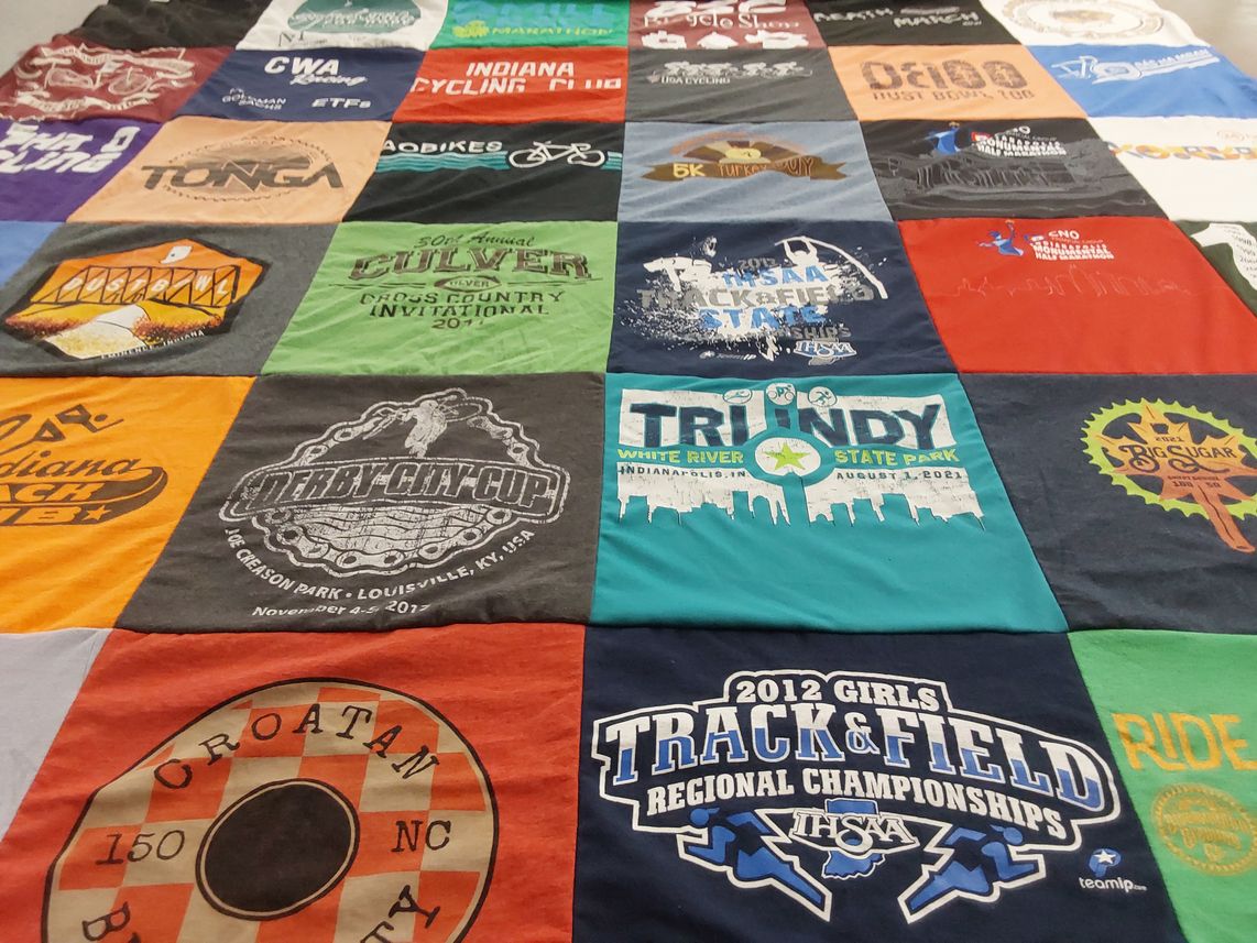 T-shirt quilt with cycling, running themes by Leigh from NC