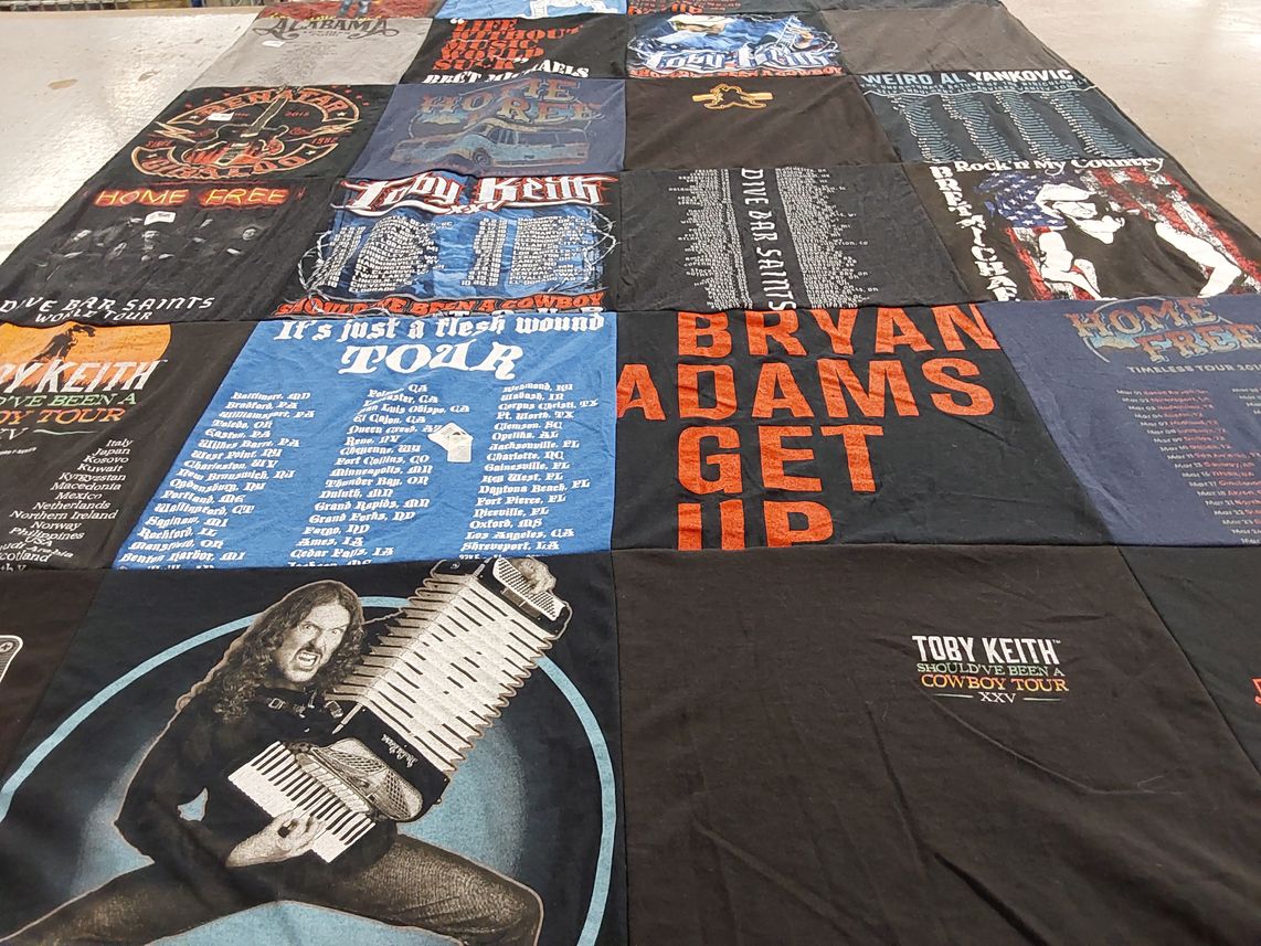T-shirt quilt with music, concerts themes by Megan from WI