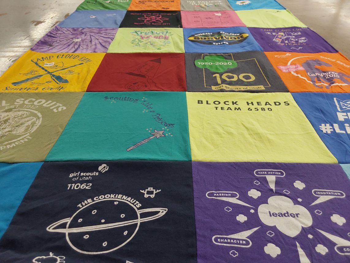 T-shirt quilt featuring block heads by Jennifer from UT