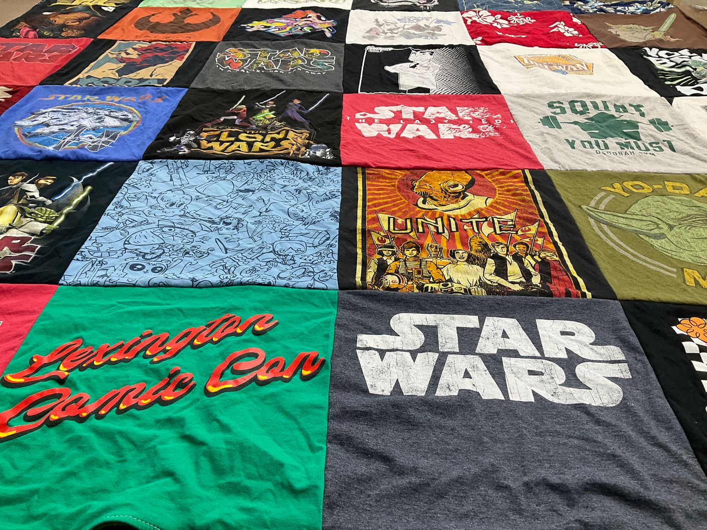 T-shirt quilt with comics, science fiction themes by Tom from KS