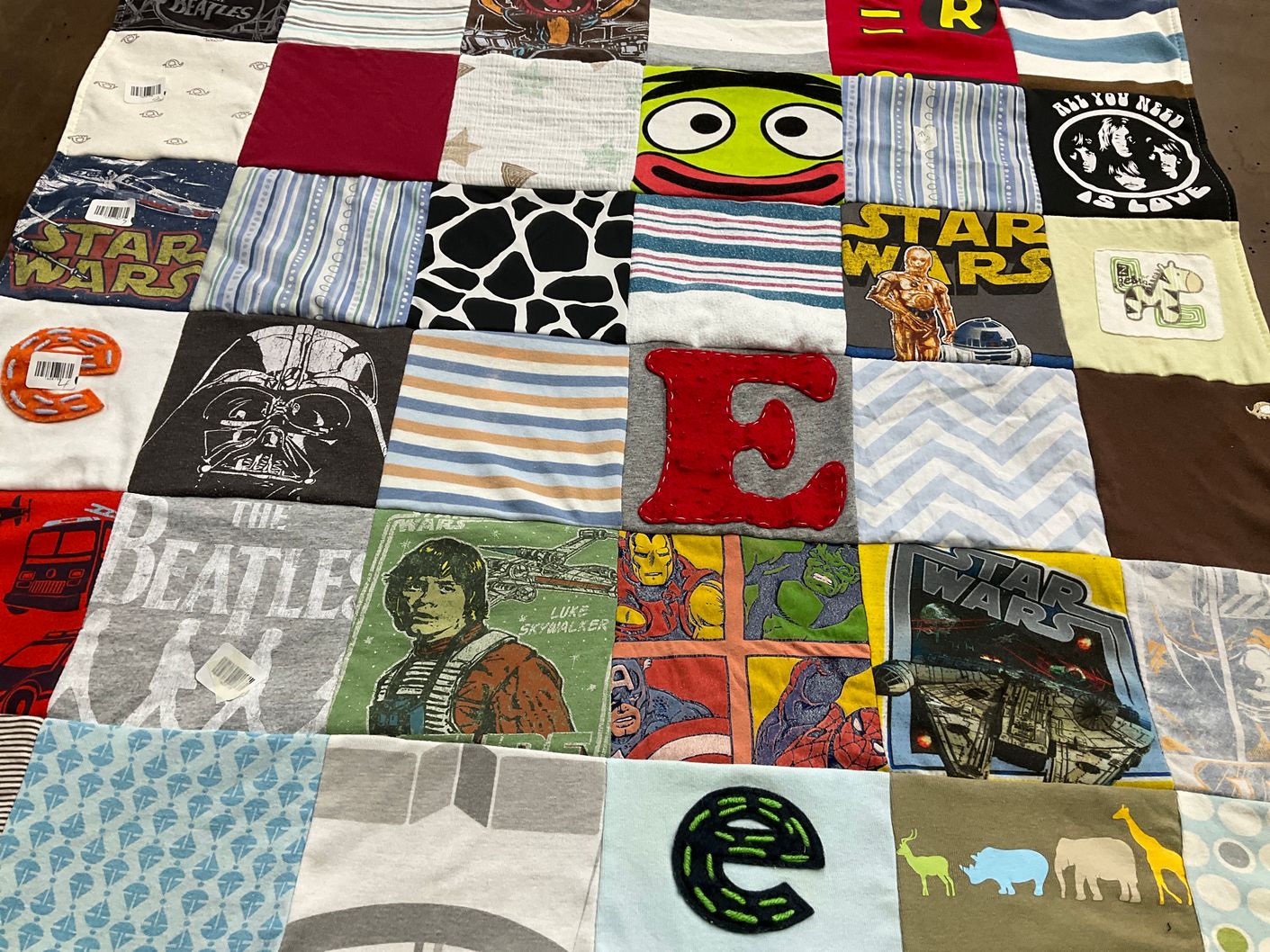 T-shirt quilt with movies, music themes by Emily from FL