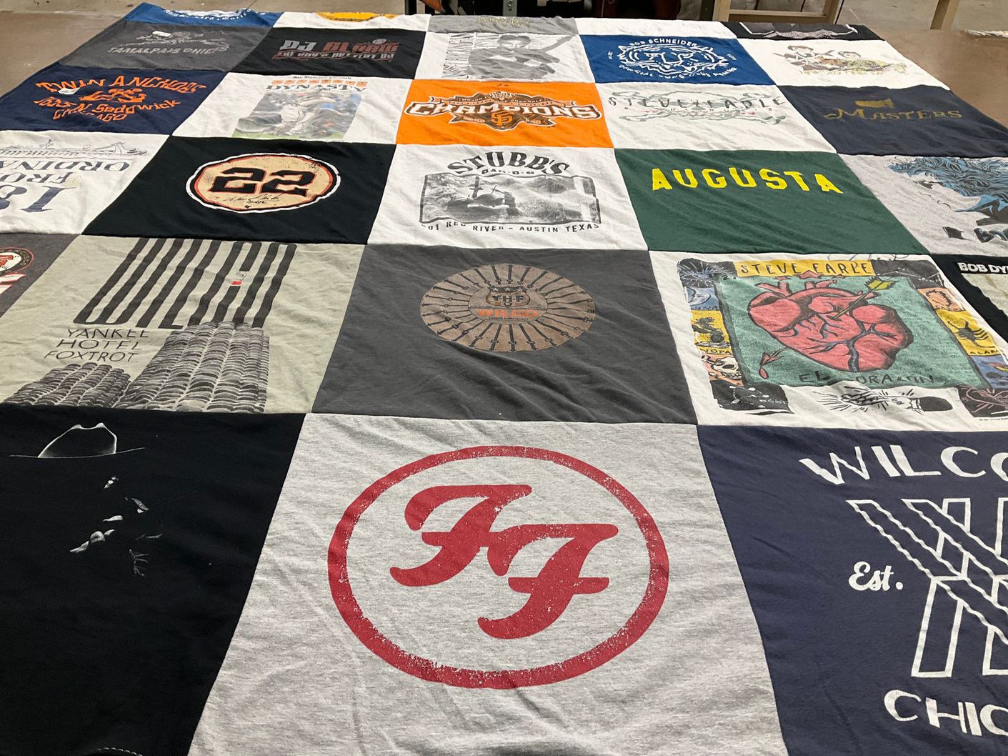 T-shirt quilt with music, golf themes by Geoffrey from CA