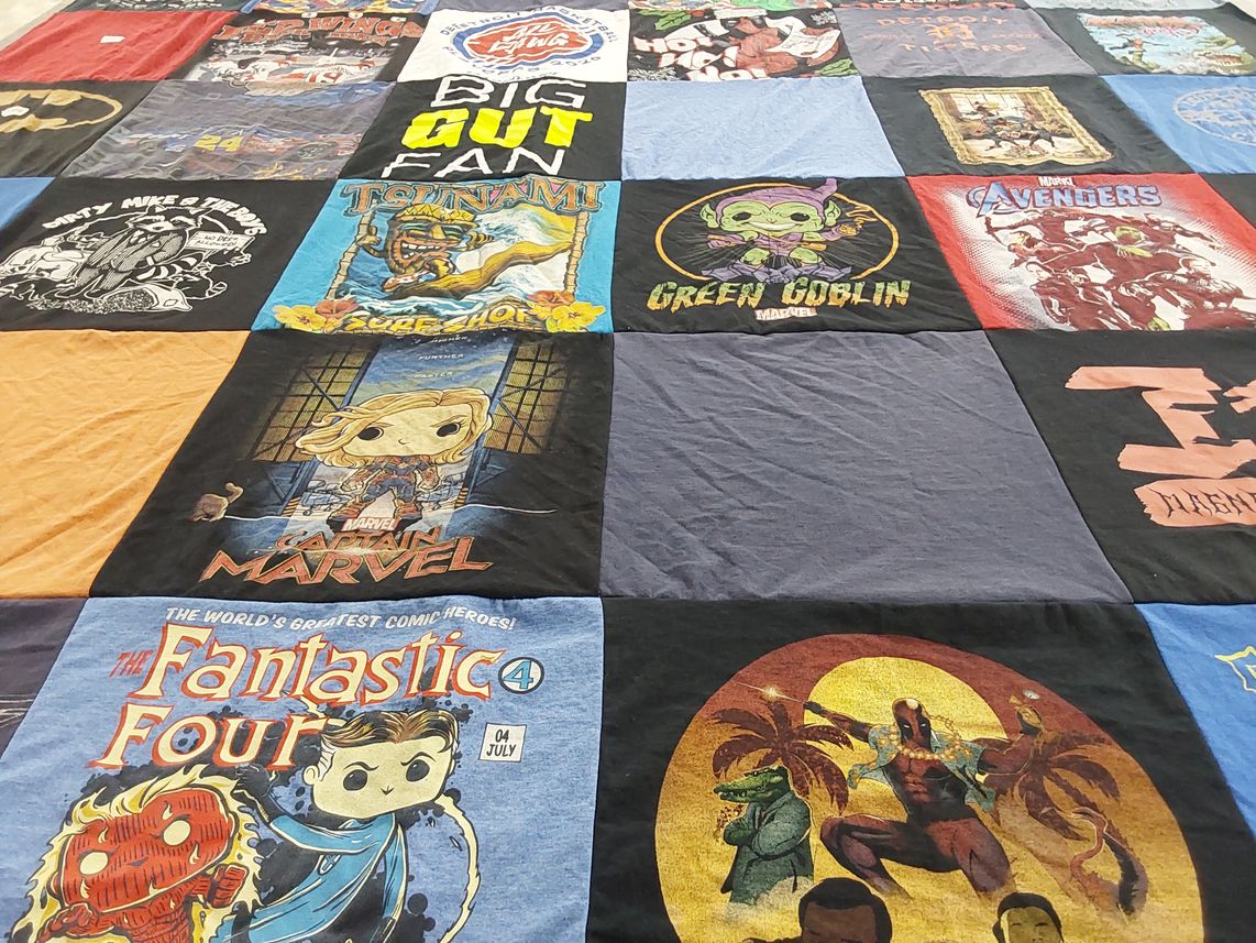 T-shirt quilt with comics, superheroes themes by Linda from MI