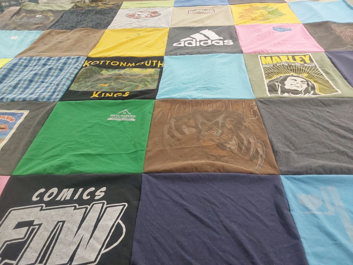 T-shirt quilt with music, comics themes by Jen from CA
