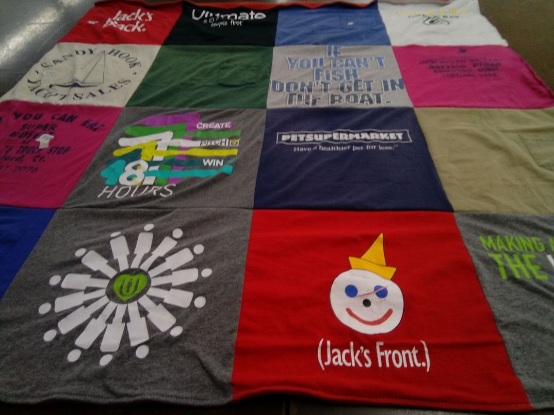 T-shirt quilt with fishing, pets themes by Shawn from FL