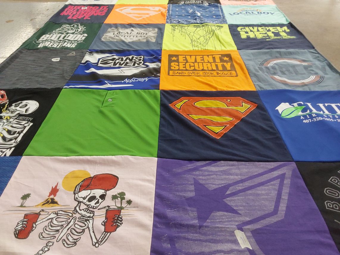 T-shirt quilt with wrestling, event security themes by REBECCA from FL