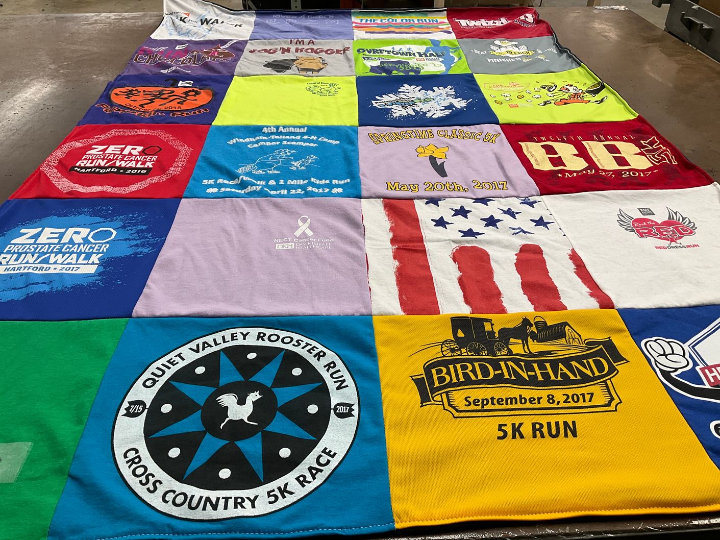 T-shirt quilt with running, cancer awareness themes by Ingrid from CT