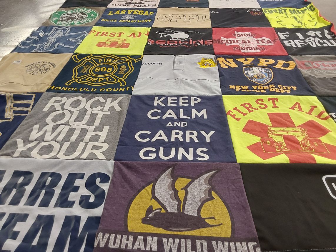 T-shirt quilt with law enforcement, fire fighting themes by James from MN