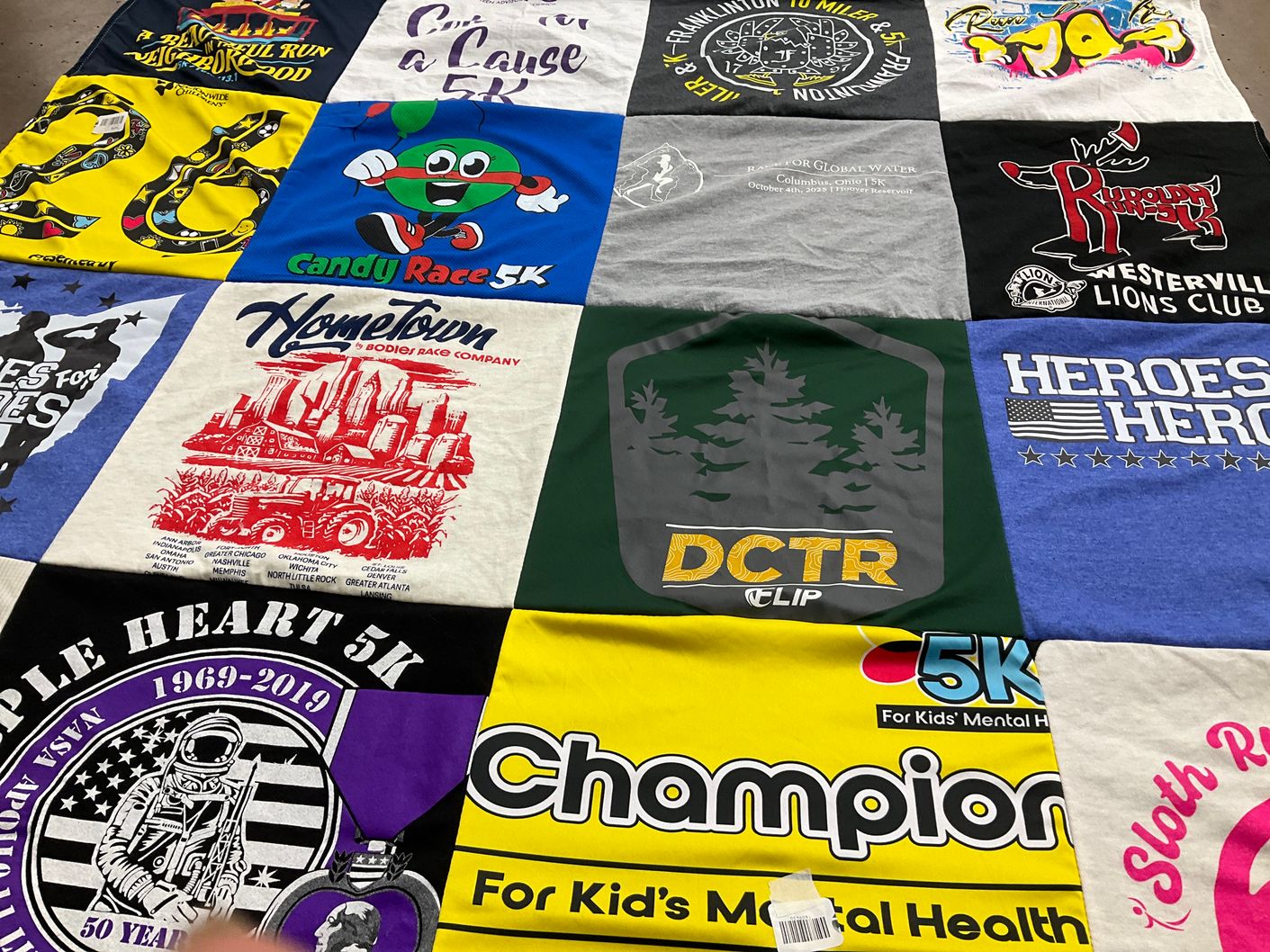 T-shirt quilt with running, charity themes by Misty from OH