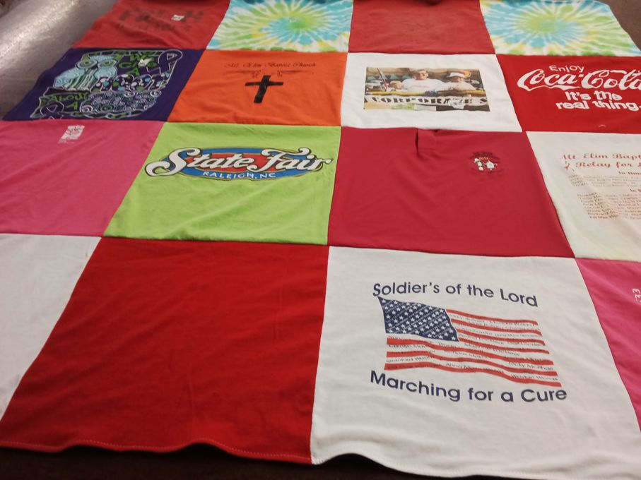 T-shirt quilt with community, charity themes by Brenda from NC