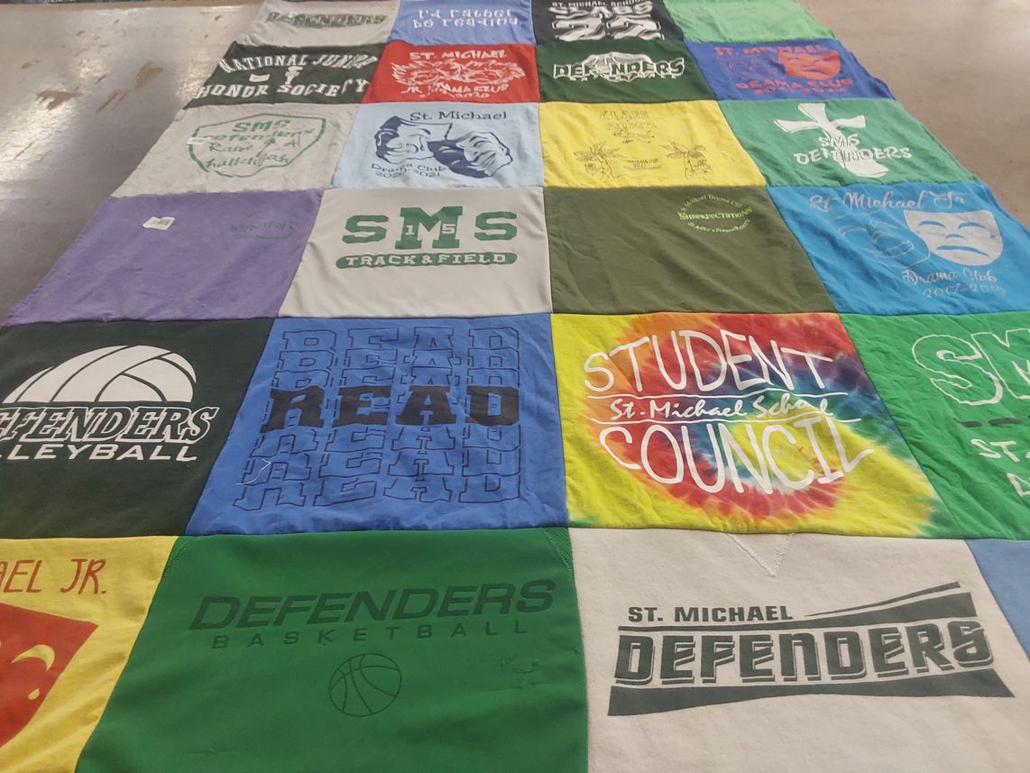 T-shirt quilt featuring st. michael defenders by Julia from OH