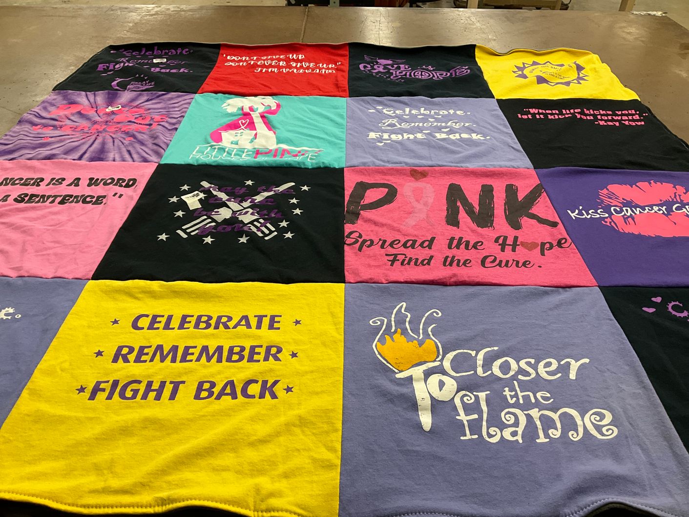T-shirt quilt with cancer awareness, support themes by Lynne from NC