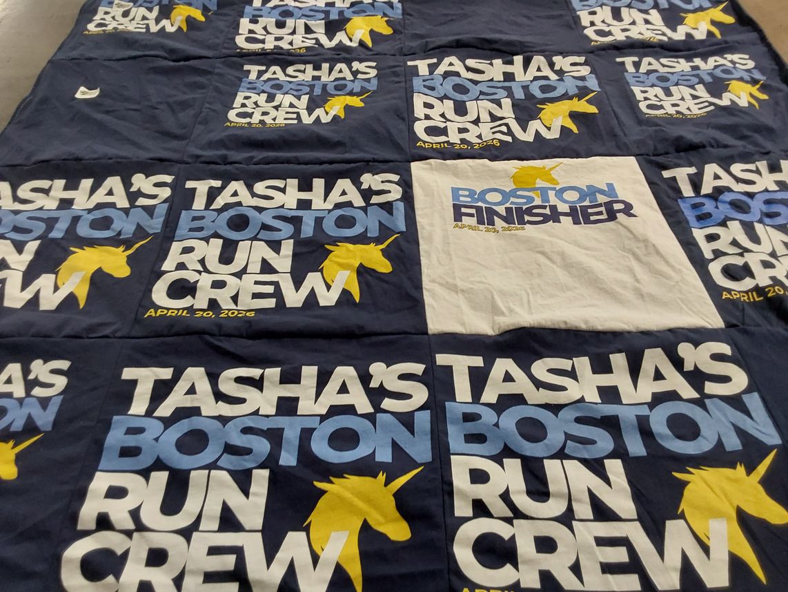 T-shirt quilt with running themes by jacque from NE
