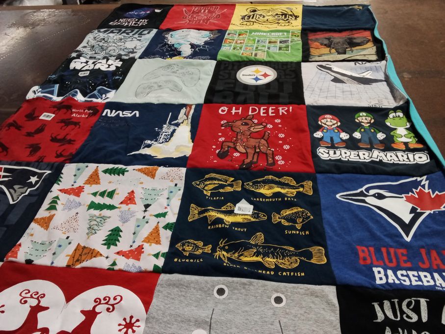 T-shirt quilt featuring new england patriots, pittsburgh steelers by Solange from VA