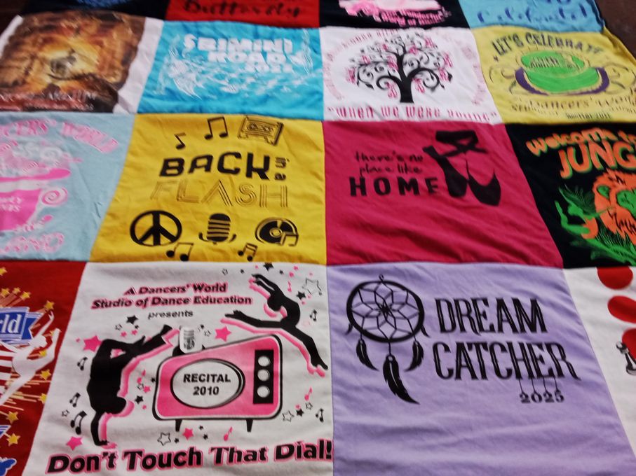 T-shirt quilt with dance, music themes by rachel from MA