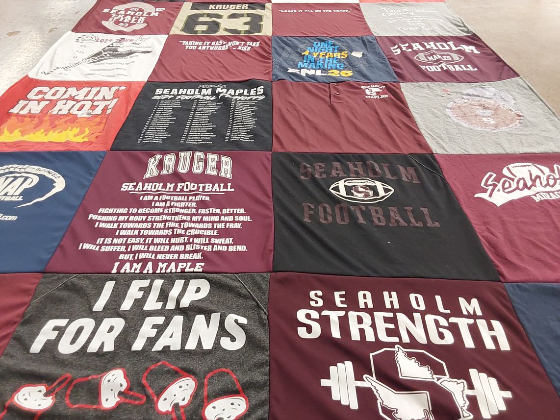 T-shirt quilt featuring seaholm football by Heather from MI