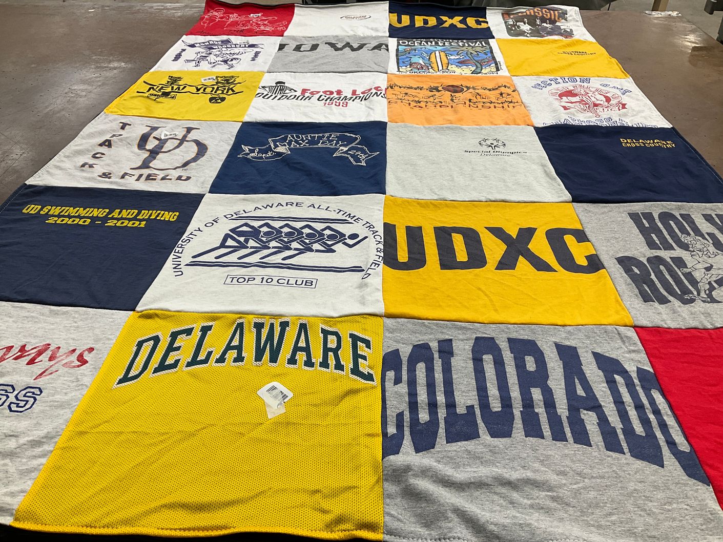 T-shirt quilt featuring university of colorado, university of delaware cross country by Emily from CA