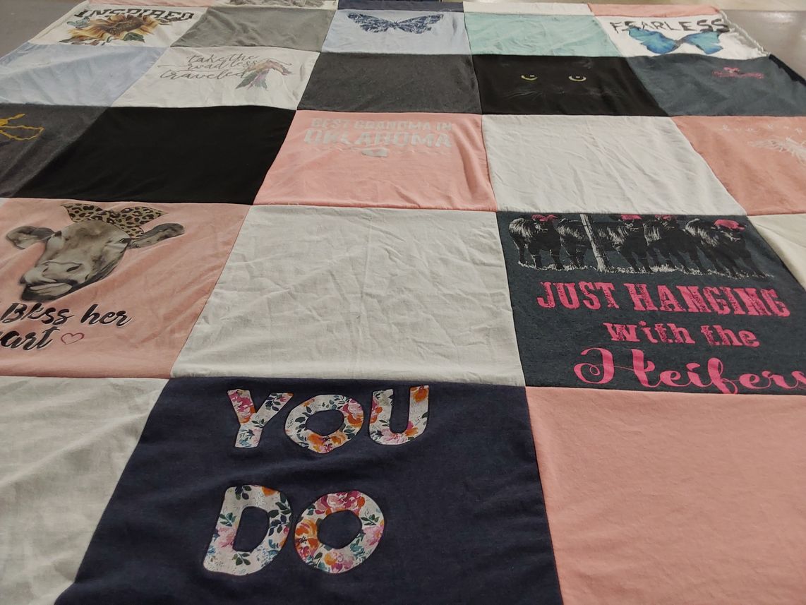 T-shirt quilt with traveling, animals themes by Eric from OK