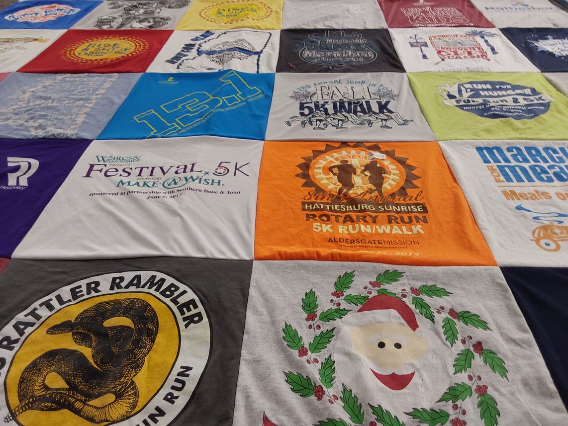 T-shirt quilt with running, events themes by Bradford from MS