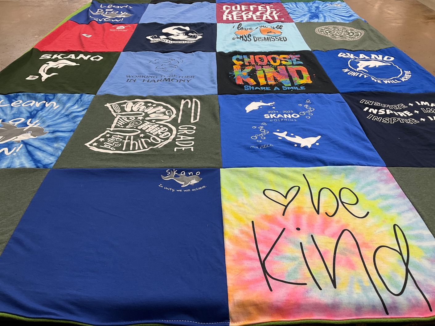 T-shirt quilt with education, kindness themes by Carole from NY