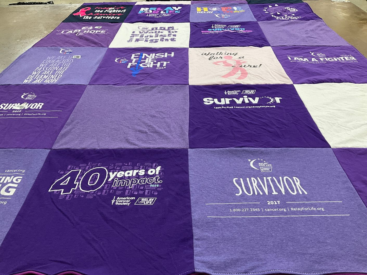 T-shirt quilt with breast cancer awareness, support themes by Gloria from IL