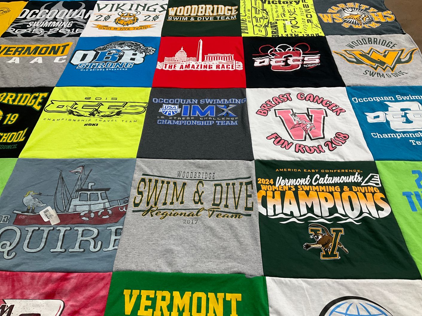 T-shirt quilt featuring university of vermont women's swimming and diving team by Stephanie from VA