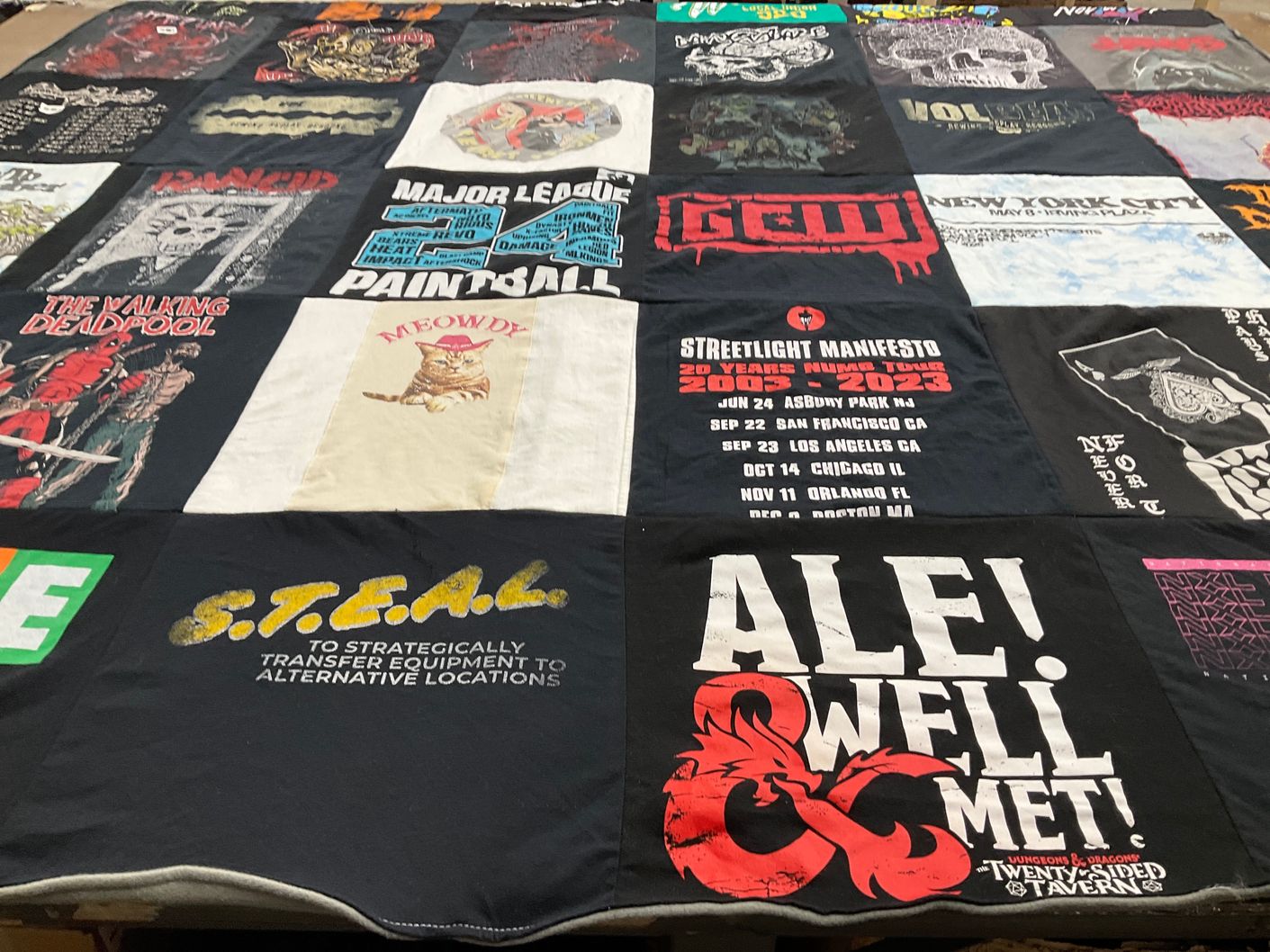 T-shirt quilt with music, comics themes by Steven from NY