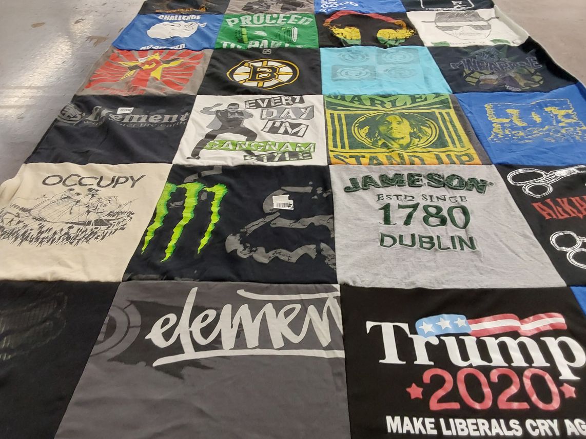 T-shirt quilt with politics, music themes by Laurie from MA