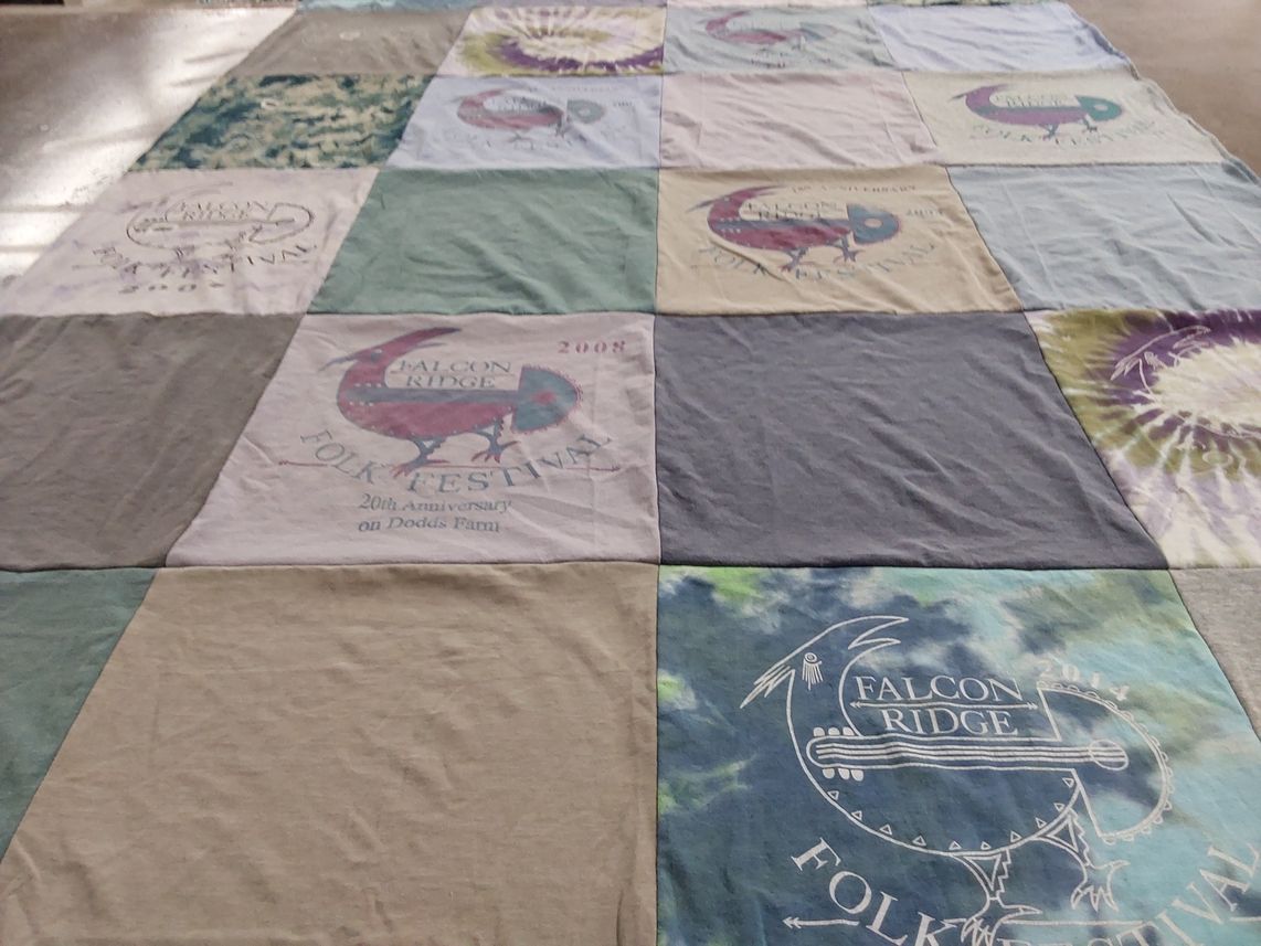 T-shirt quilt with folk music, festivals themes by Kathleen from VT