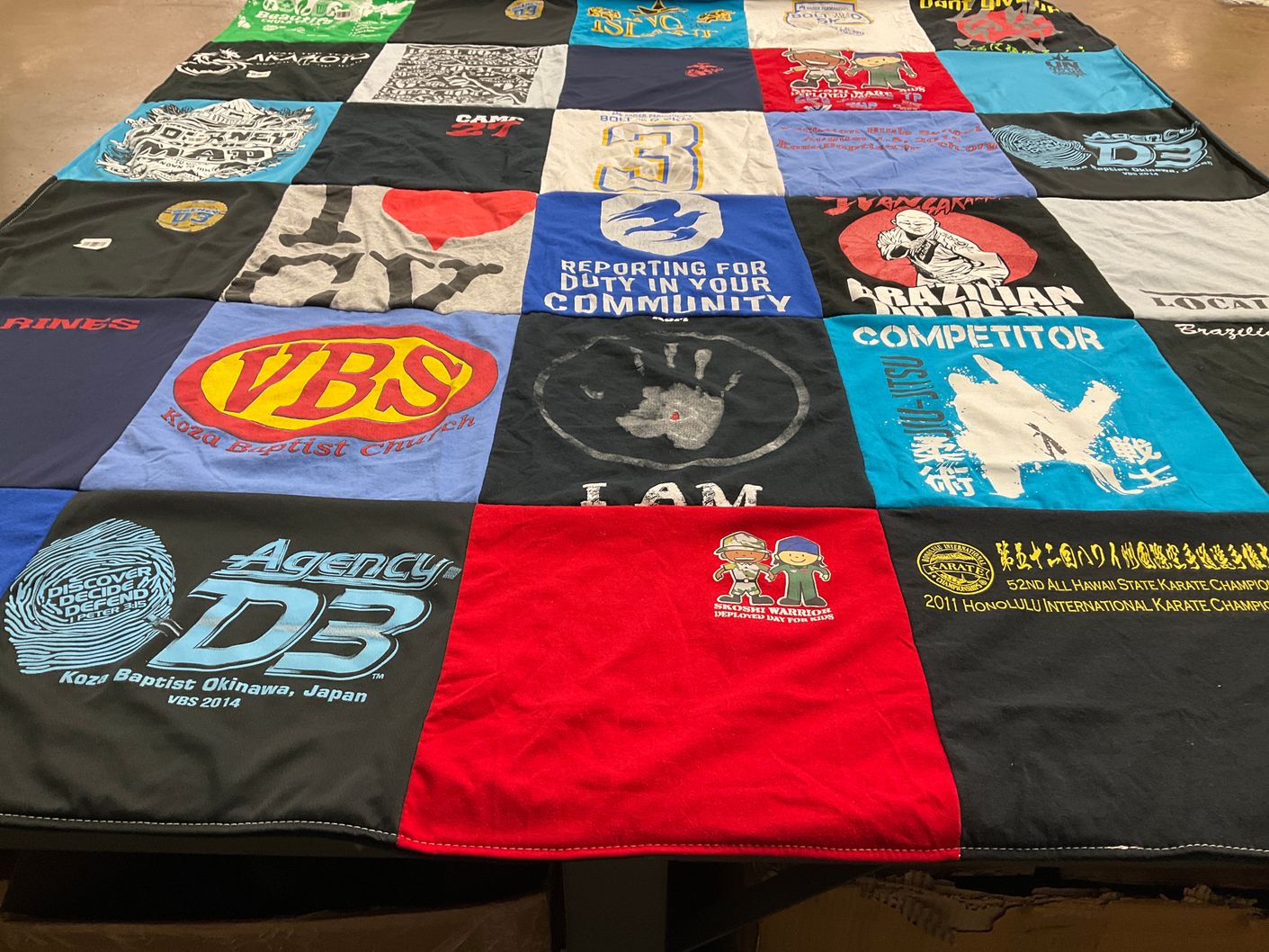 T-shirt quilt with karate, community service themes by Justine from WA