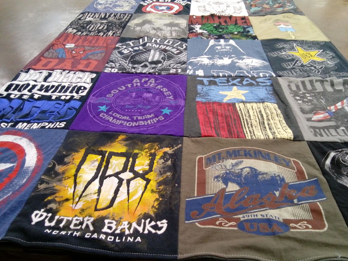 T-shirt quilt with comics, music themes by Marjorie from NJ