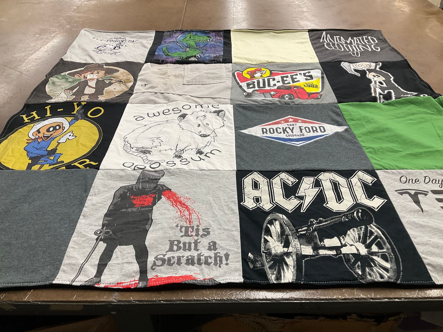 T-shirt quilt with fishing, music themes by Kelli from OK