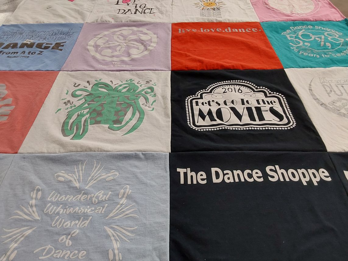 T-shirt quilt with dance themes by Ingrid from NC