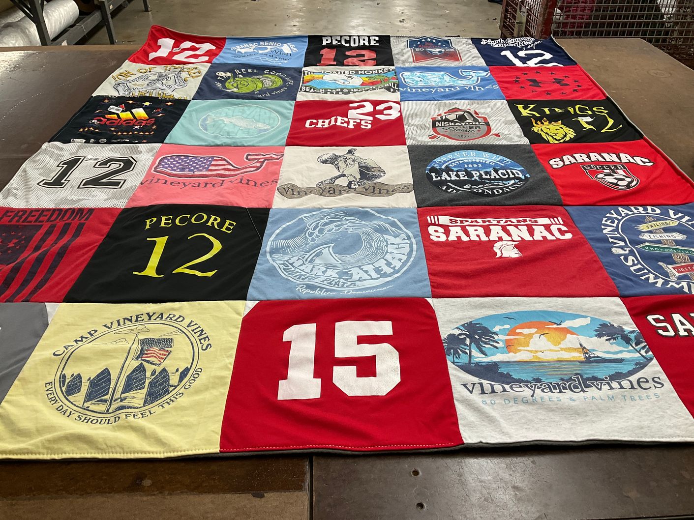 T-shirt quilt with camping, outdoor activities themes by Cheryl from NY