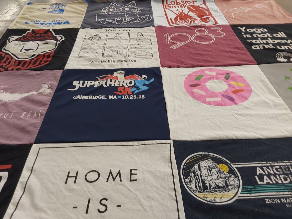 T-shirt quilt with yoga, running themes by Marion from MA