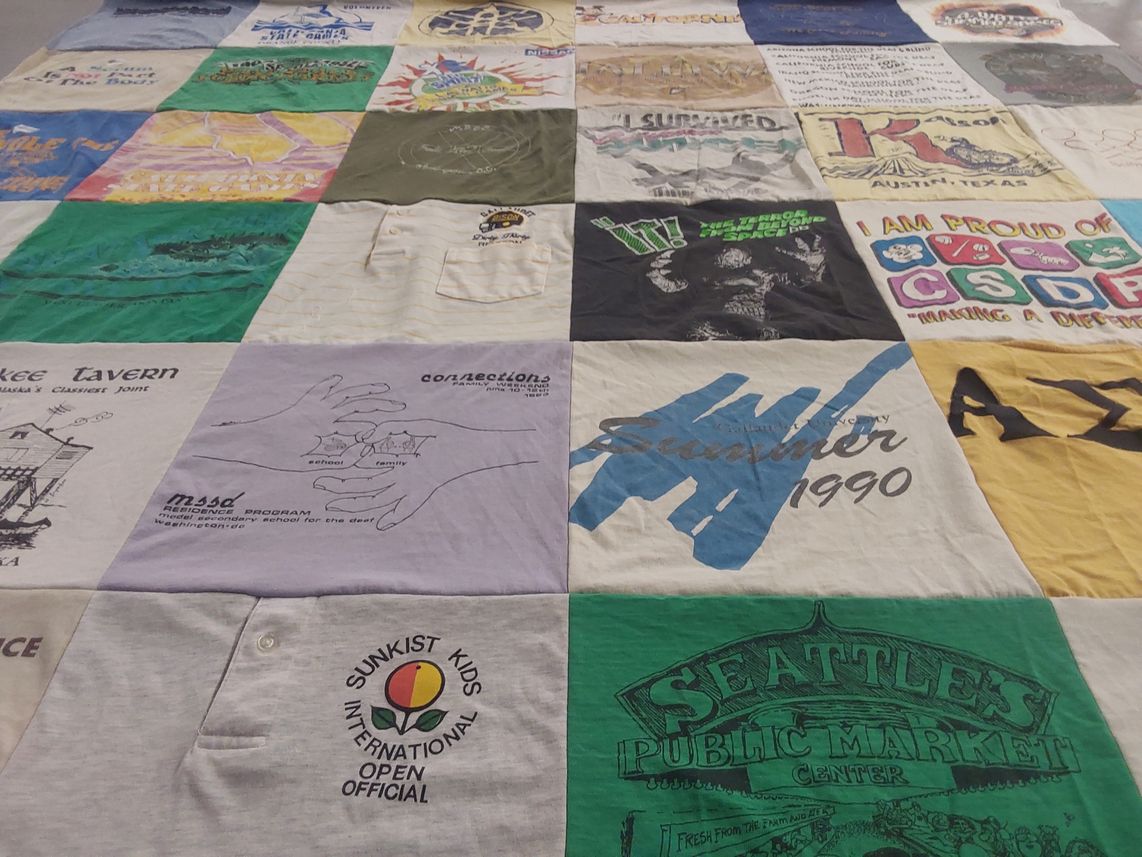T-shirt quilt with community service, education themes by Julianna from CA