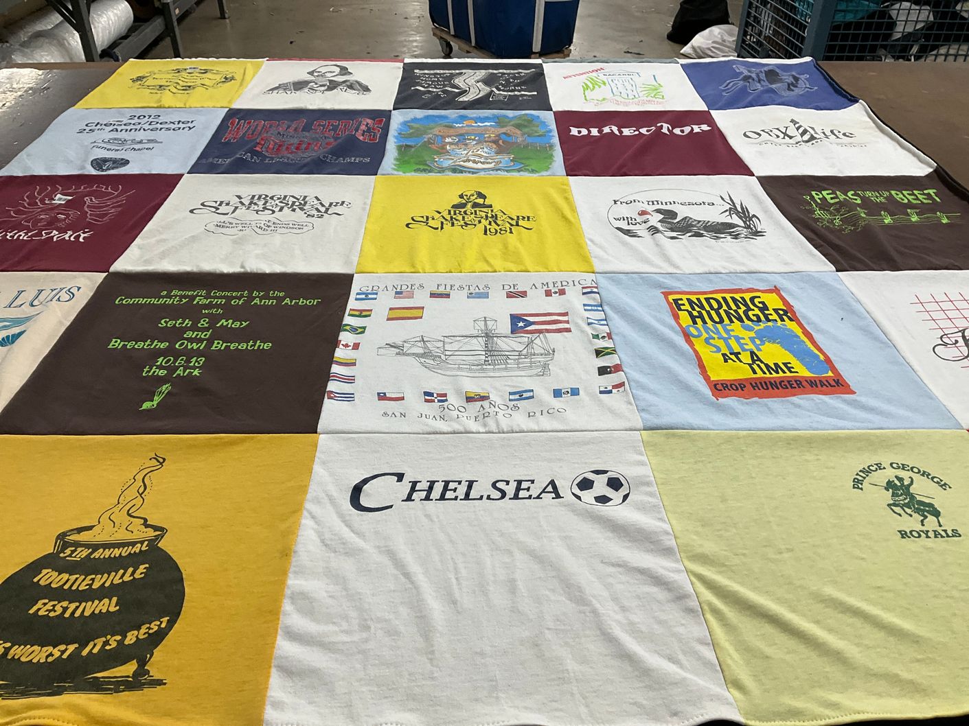 T-shirt quilt with community events, hunger awareness themes by Kathy from PA