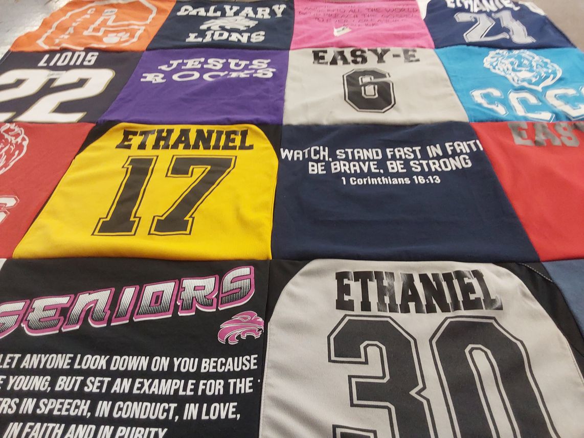 T-shirt quilt featuring >calvary lions by Jennel from NV