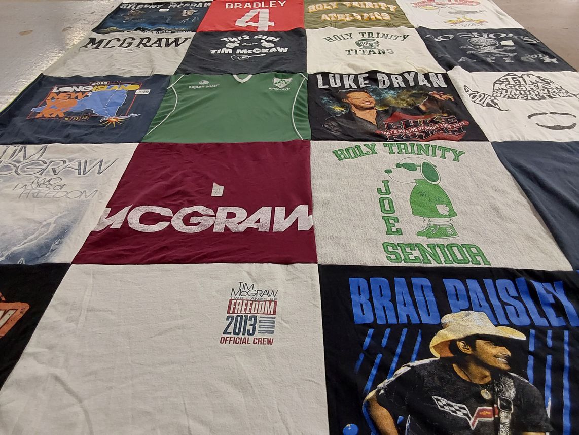 T-shirt quilt with country music themes by Kim from NY