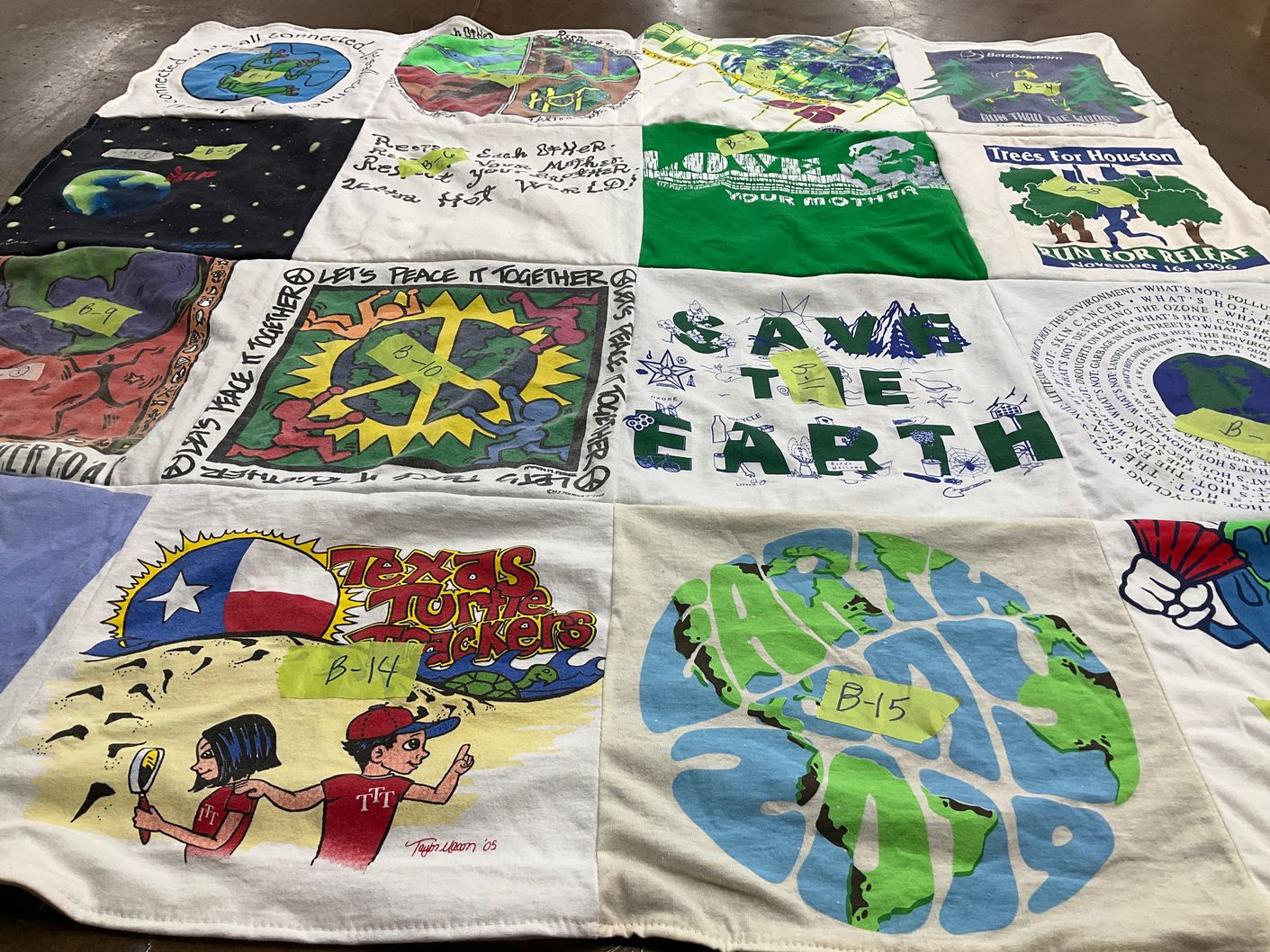 T-shirt quilt with environmental awareness, community service themes by Sevin from TX